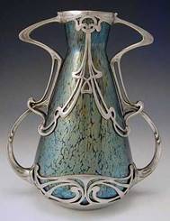 Loetz irridescent glass vase with pewter Art Nouveau mount. 1905: 
